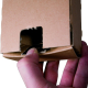 Trapez Versandverpackung 705x105/55x75mm für gerollte Güter mit Selbstklebeverschluss A1+